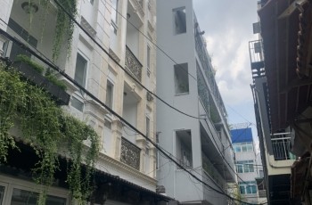 Nhà 5 lầu Trương Quốc Dung 9 phòng ngủ - nhà mới